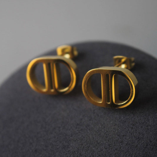 CD Navy Studs | Classic Elegance with a Bold Touch
